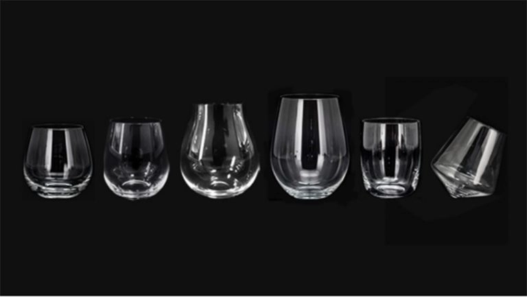 Stemless glass works well when one shape has to cover water, wine, juice, tasting pours, and casual table drinks